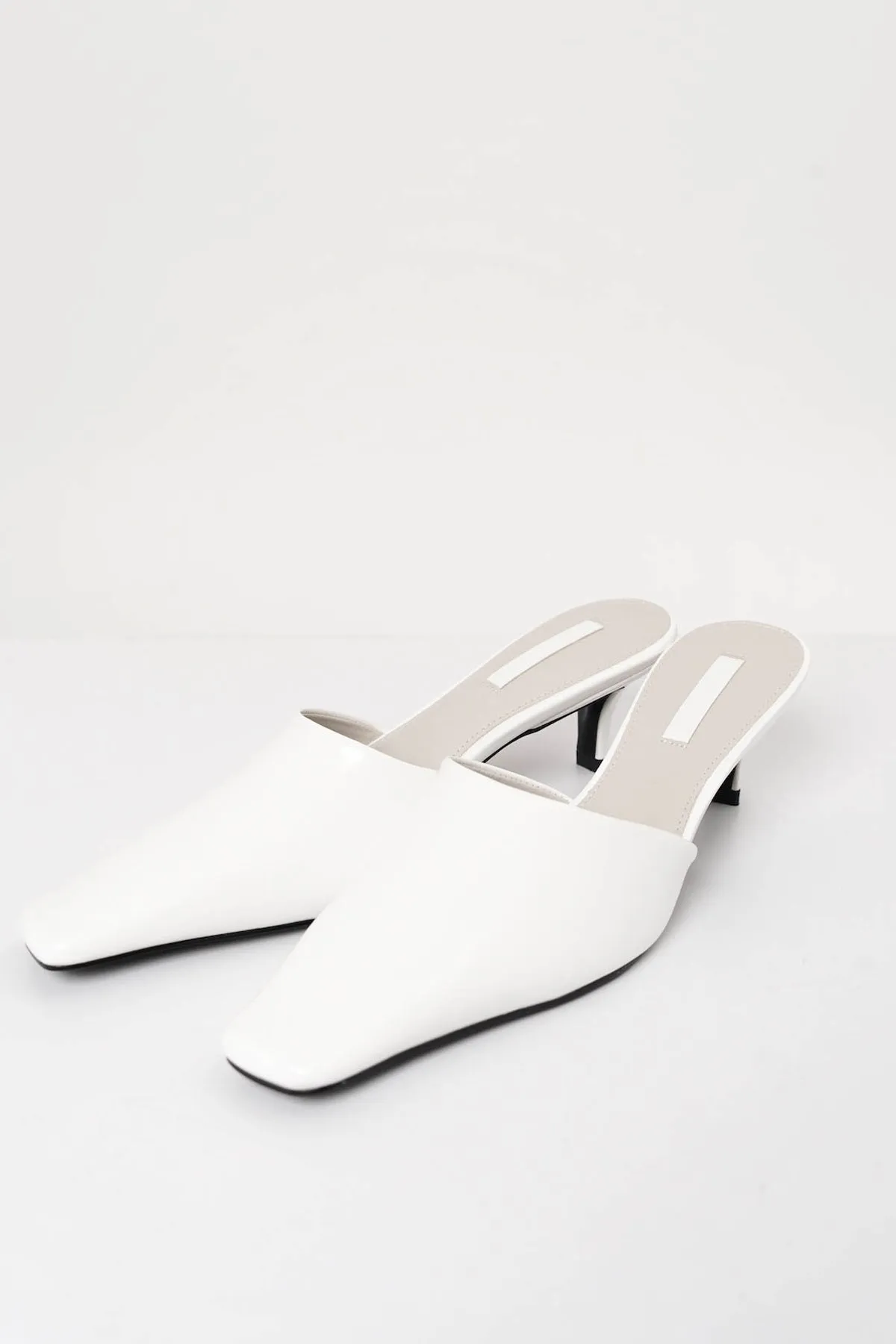 Zyla Mules In White